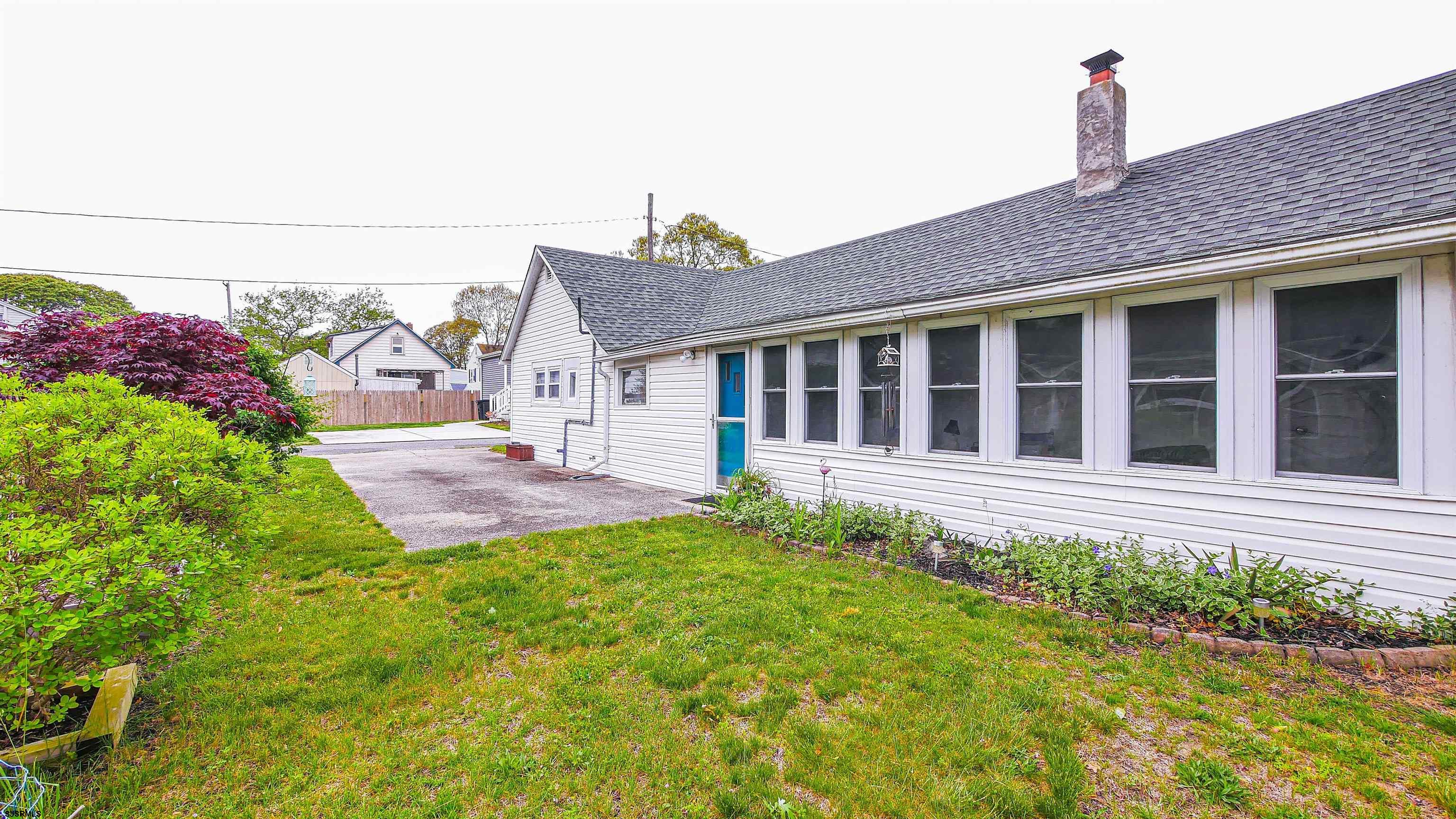 605 1st Street Somers Point, NJ 08244 - Photo 8 of 33 a view of a house with a yard