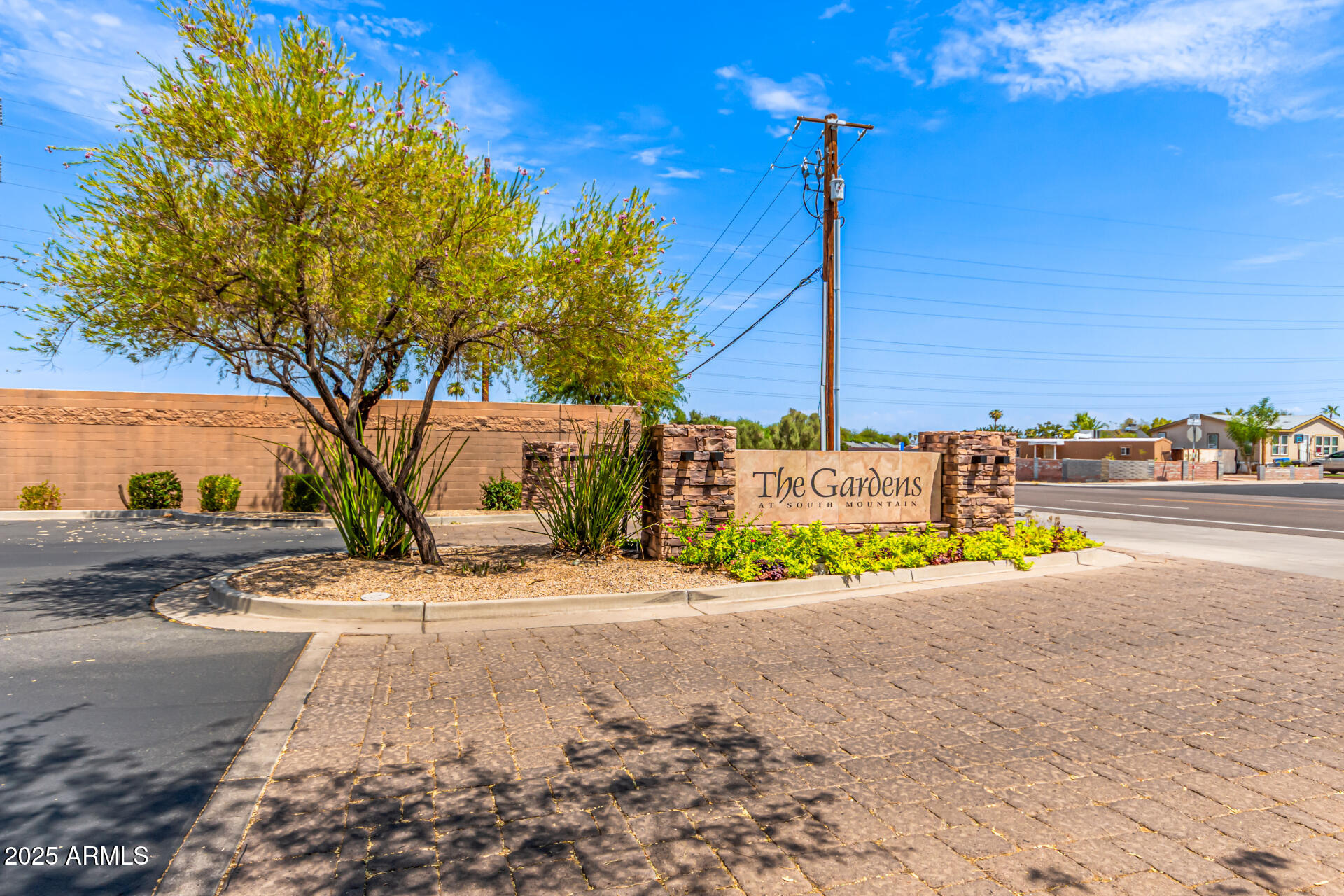 3908 East Minton Street Phoenix, AZ 85042 - Photo 2 of 31 a view of a street with tall buildings