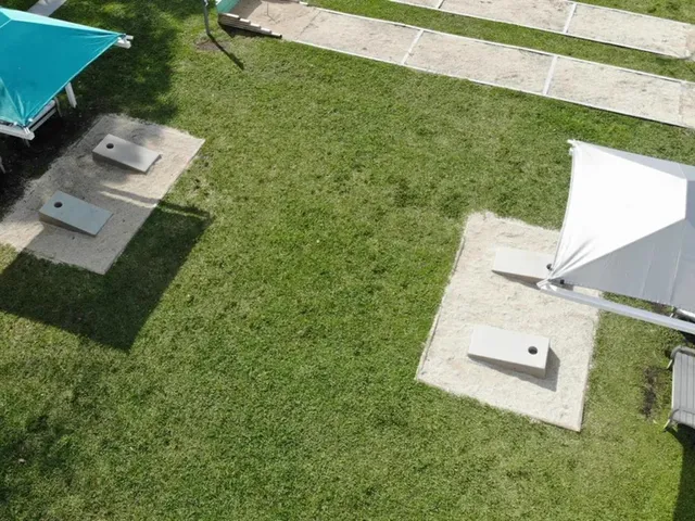 a room with that has a pool table and chairs