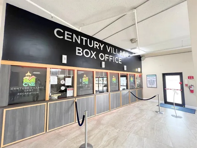 a view of a dining room and livingroom with lots of counter space