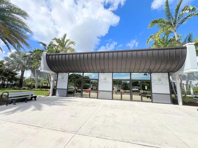a view of a park with large trees