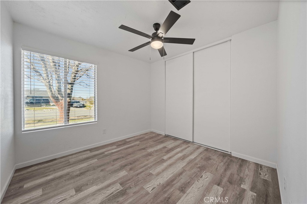 40054 Ridgemist Street Palmdale, CA 93591 - Photo 16 of 21 a view of an empty room with a window