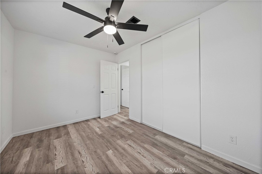 40054 Ridgemist Street Palmdale, CA 93591 - Photo 19 of 21 wooden floor in an empty room