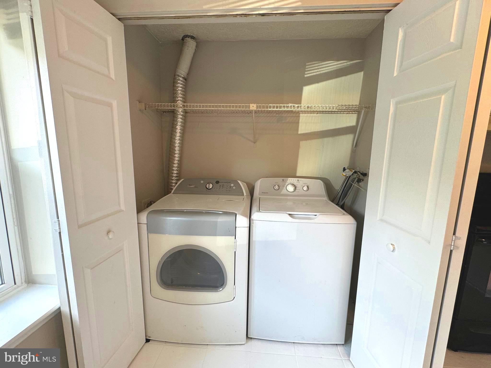 3615 Wharf Lane Triangle, VA 22172 - Photo 19 of 23 a utility room with dryer and washer