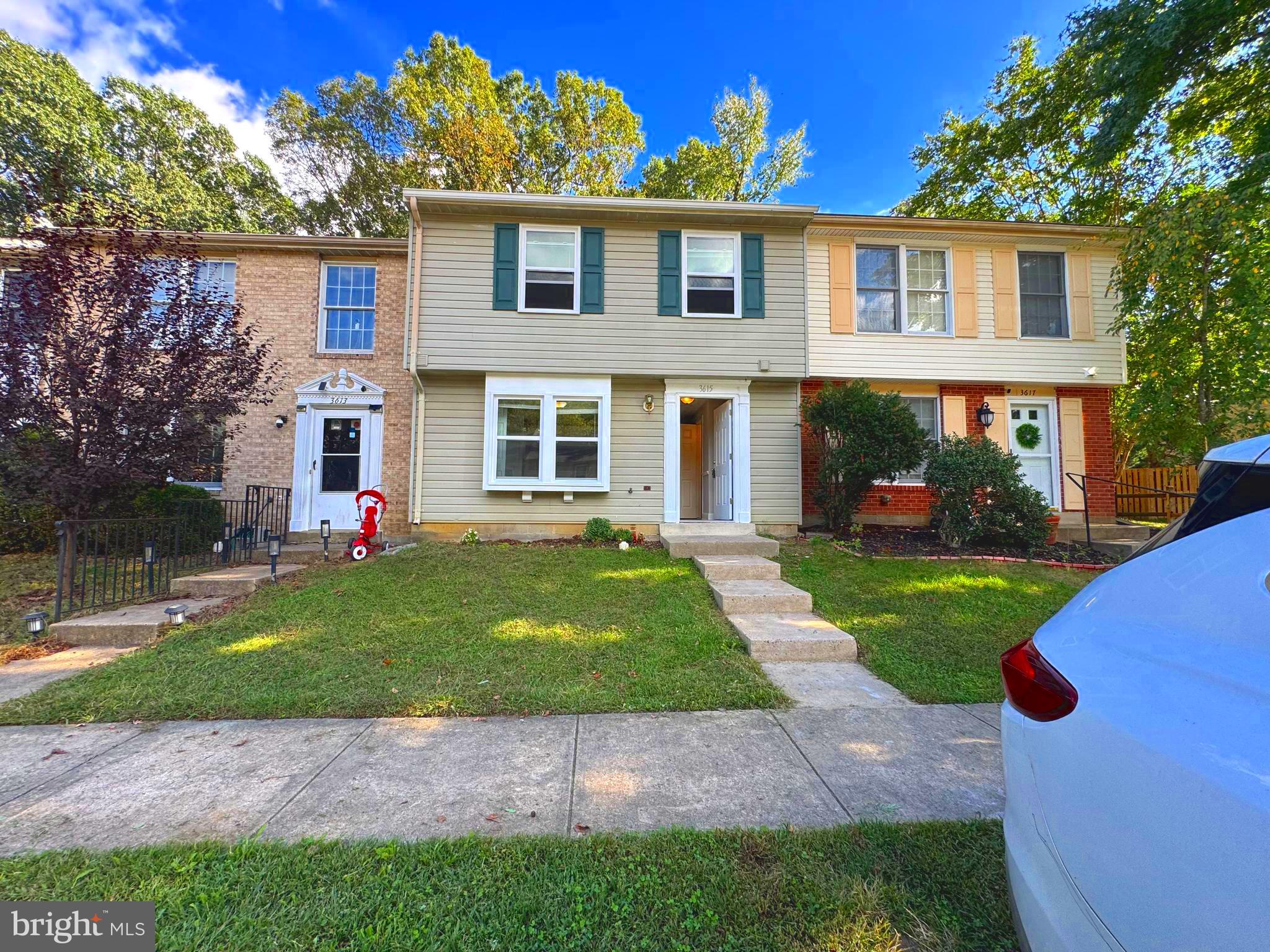 3615 Wharf Lane Triangle, VA 22172 - Photo 2 of 23 a front view of a house with garden