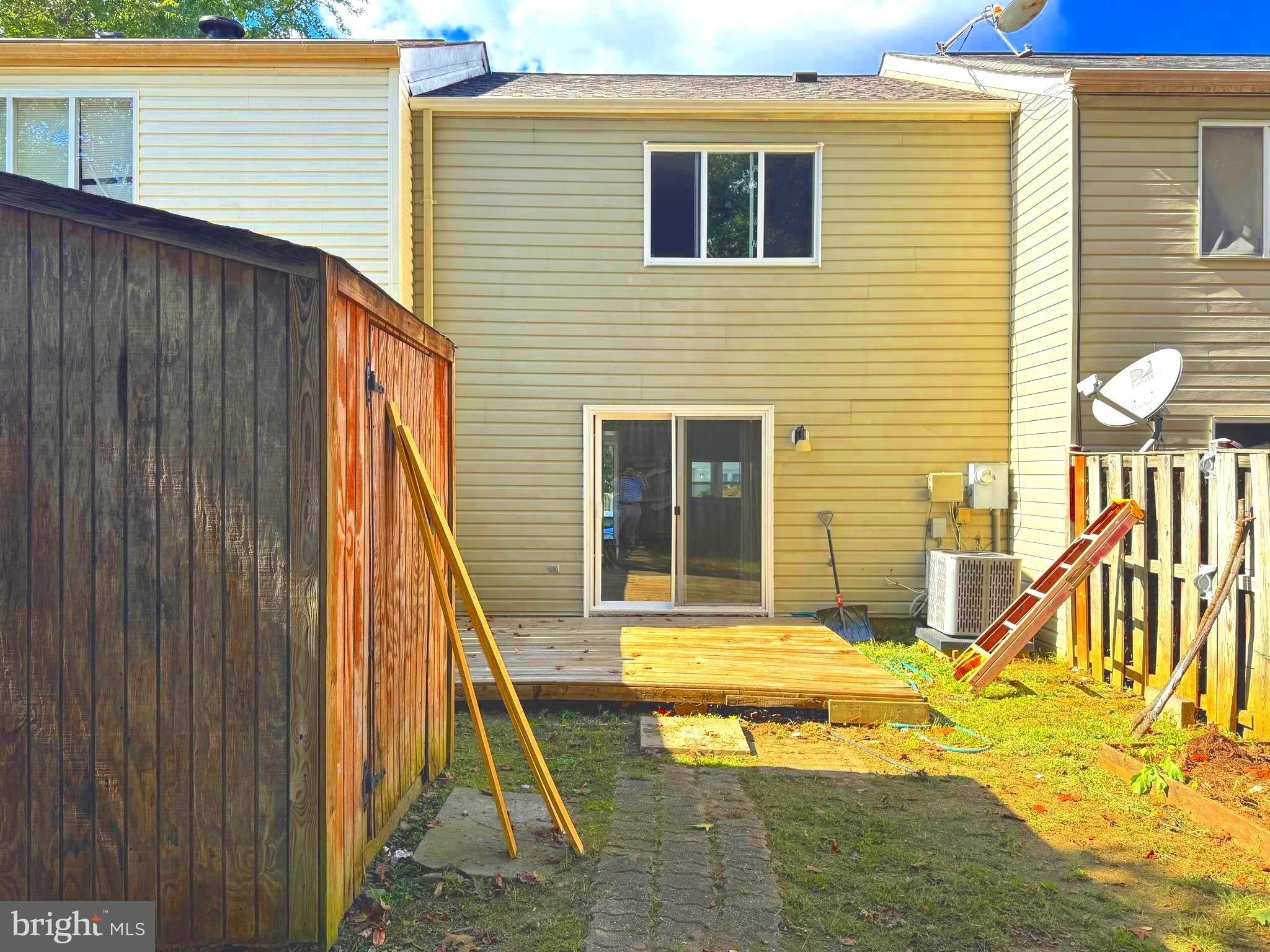 3615 Wharf Lane Triangle, VA 22172 - Photo 22 of 23 a view of a house with a patio