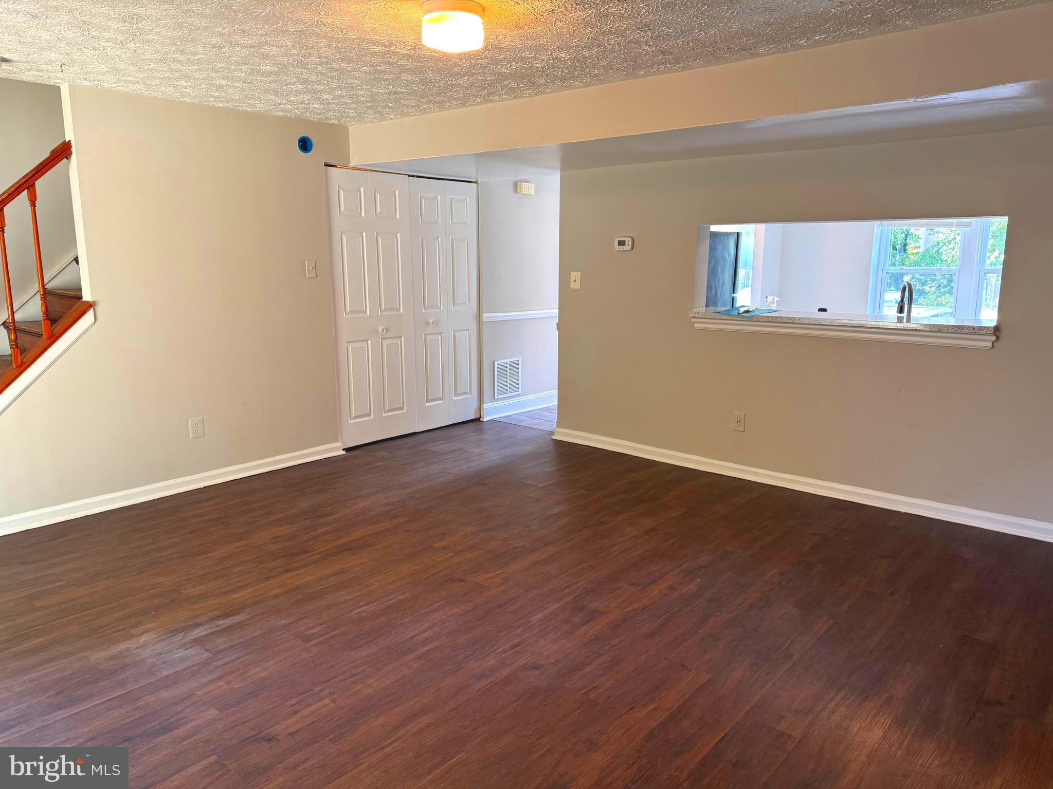3615 Wharf Lane Triangle, VA 22172 - Photo 10 of 23 a view of an empty room with wooden floor