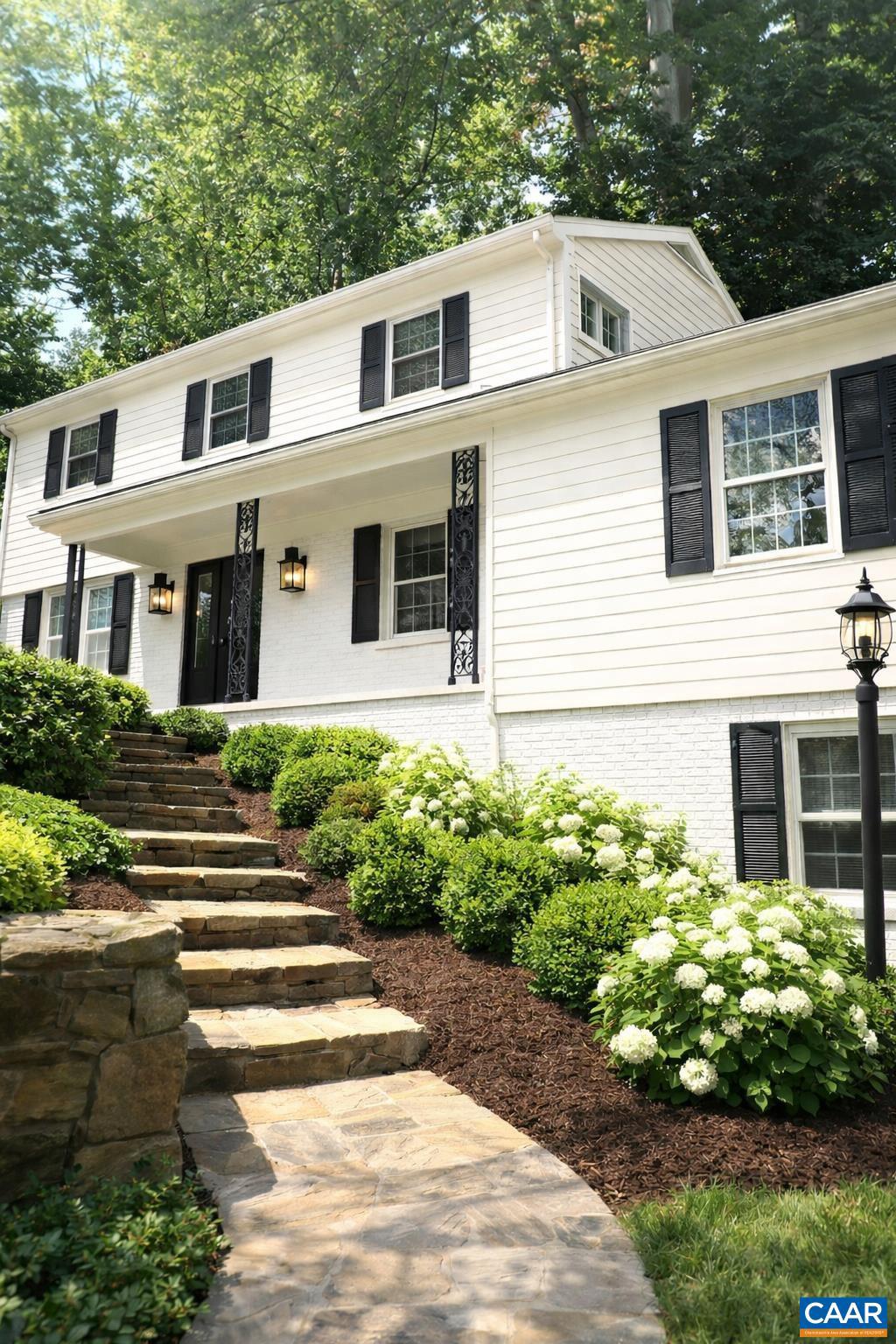 21 Deer Path Charlottesville, VA 22903 - Photo 3 of 27 a front view of a house with garden