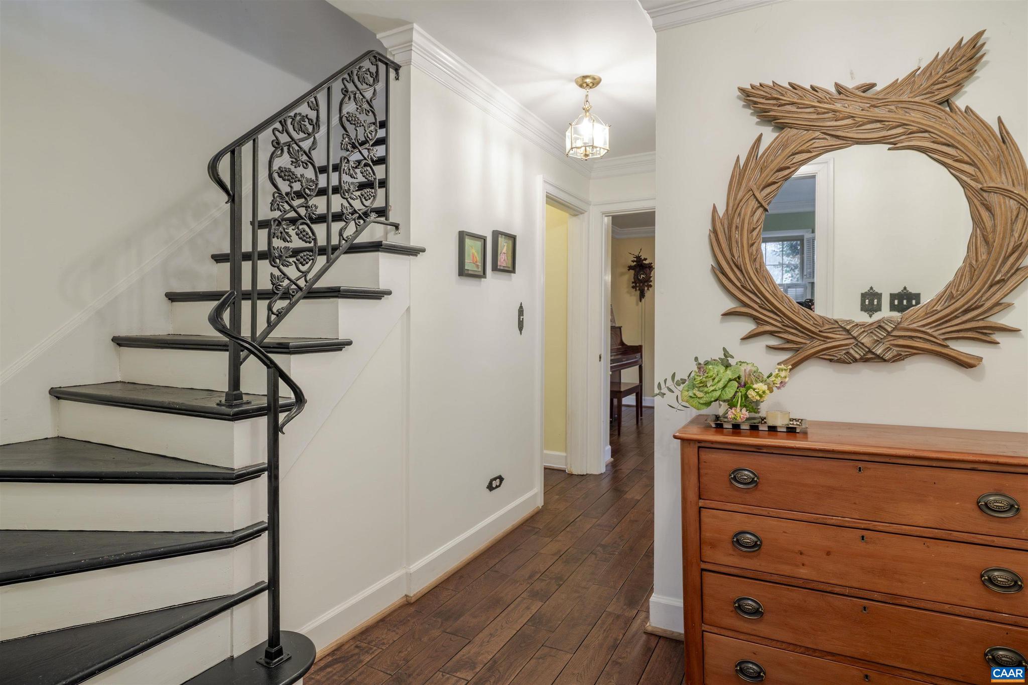21 Deer Path Charlottesville, VA 22903 - Photo 5 of 27 a view of a hallway with wooden floor and staircase