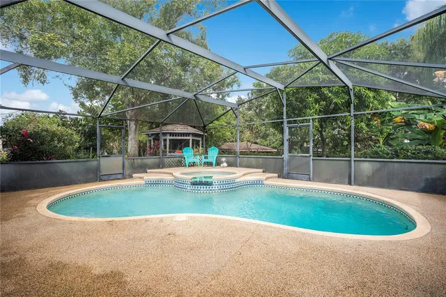 a view of outdoor space with swimming pool