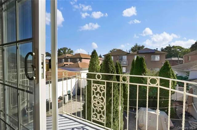 a view of a balcony with city view