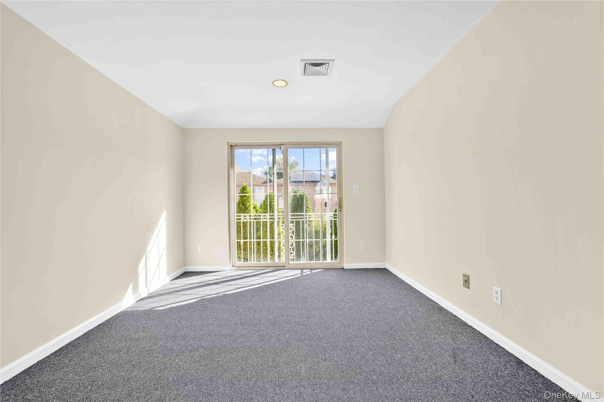 88-20 70th Road Queens, NY 11375 - Photo 20 of 31 a view of an empty room with a window
