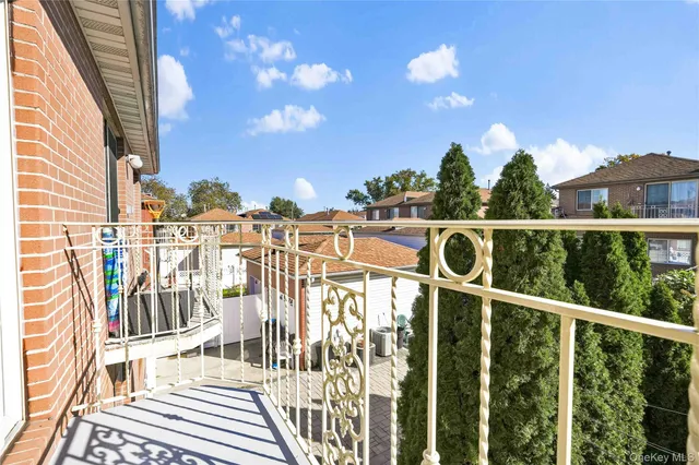 a bathroom with a granite countertop bathtub shower sink vanity and toilet