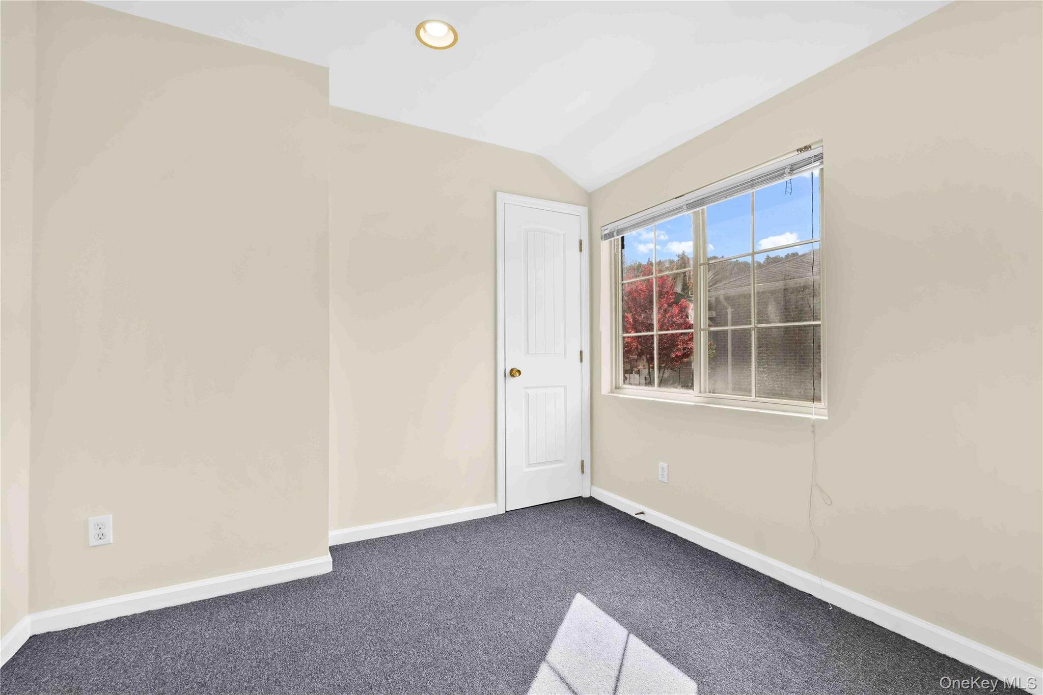 88-20 70th Road Queens, NY 11375 - Photo 26 of 31 a view of an empty room with a window