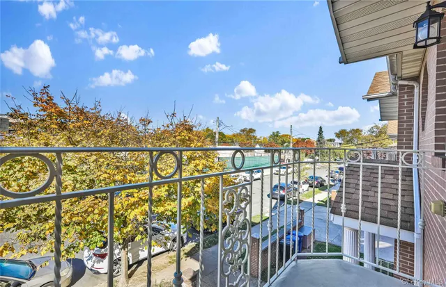 a view of a balcony with city view