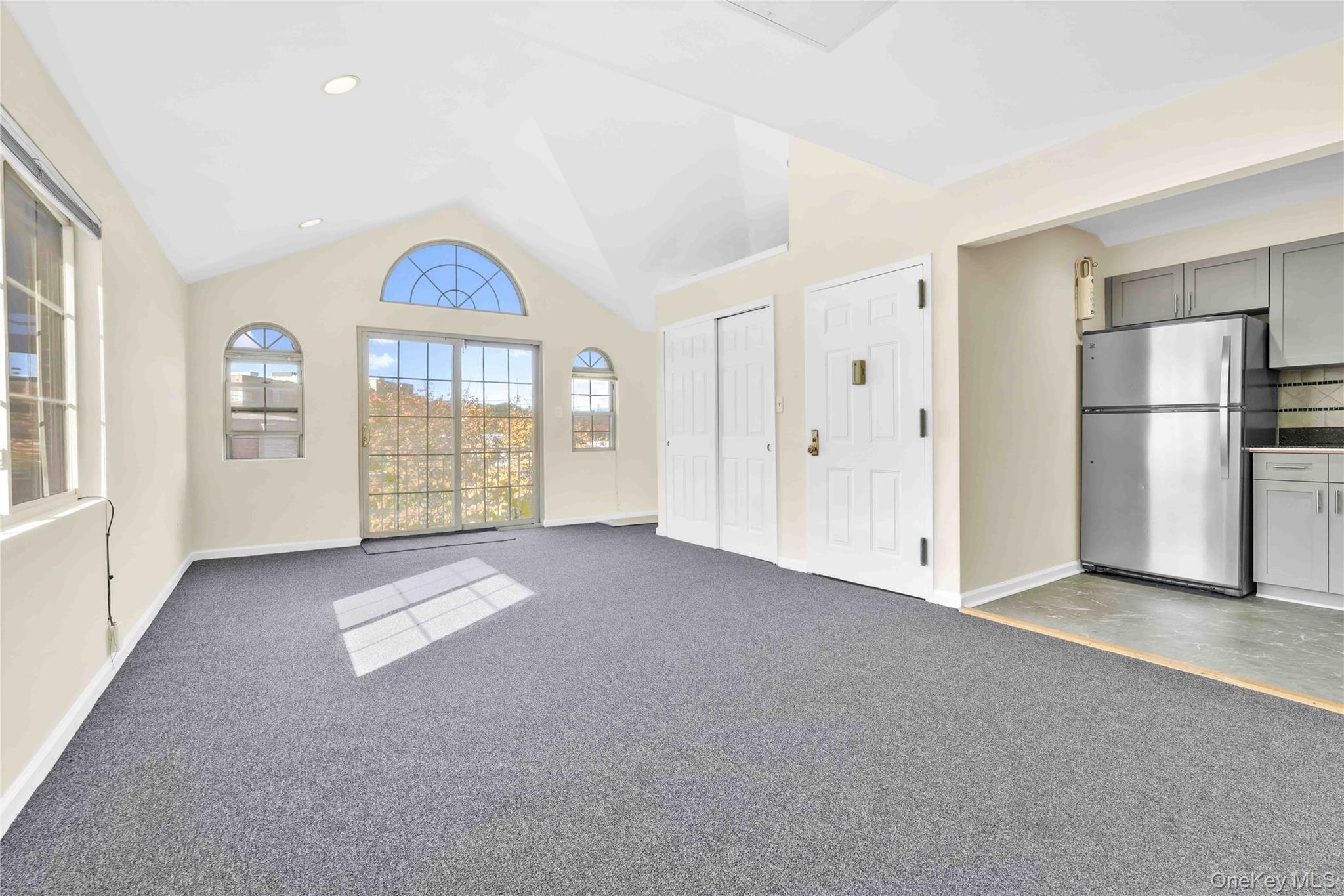 88-20 70th Road Queens, NY 11375 - Photo 9 of 30 a view of an empty room with a window