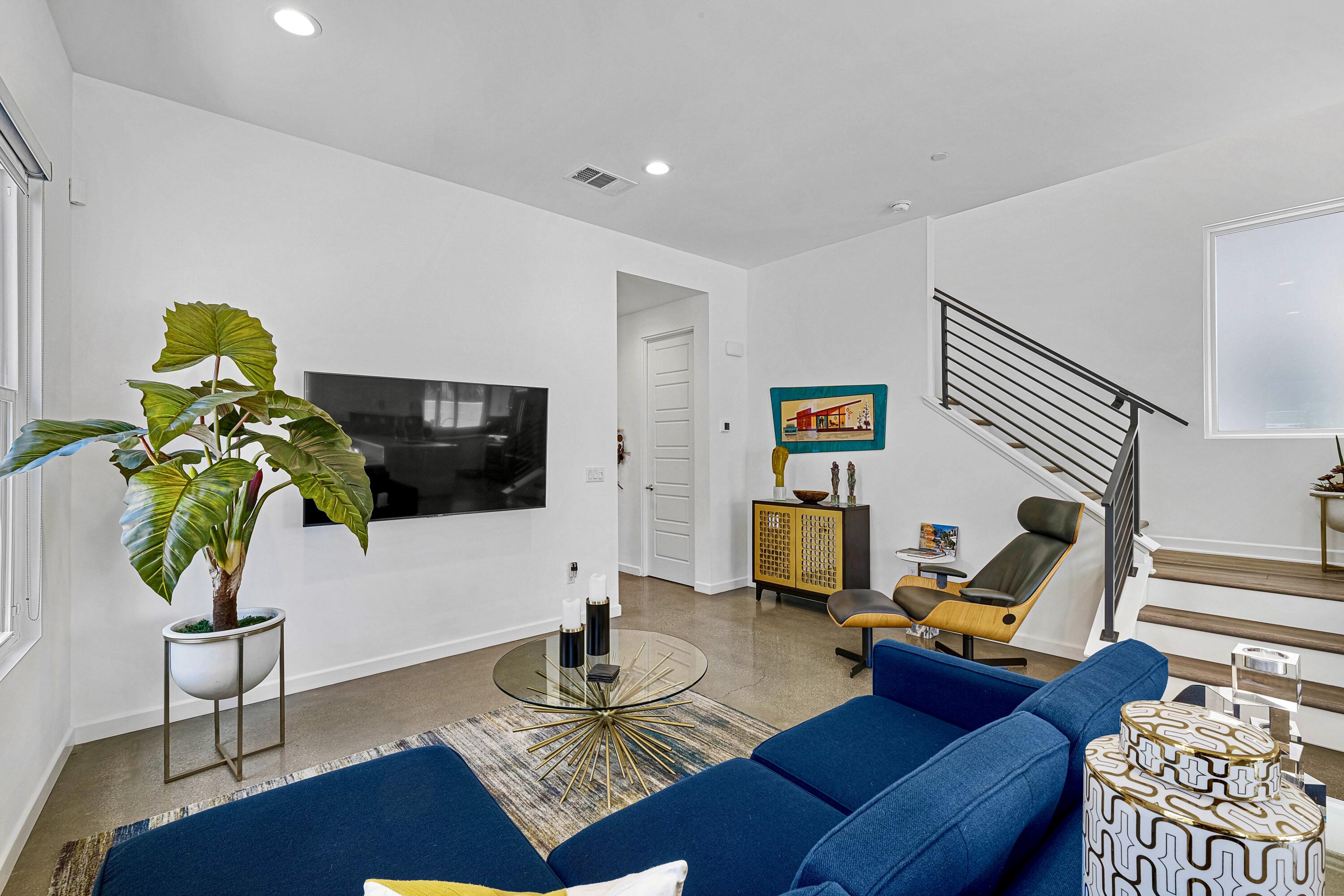489 Beacon Way Palm Springs, CA 92262 - Photo 12 of 35 a living room with furniture and a flat screen tv