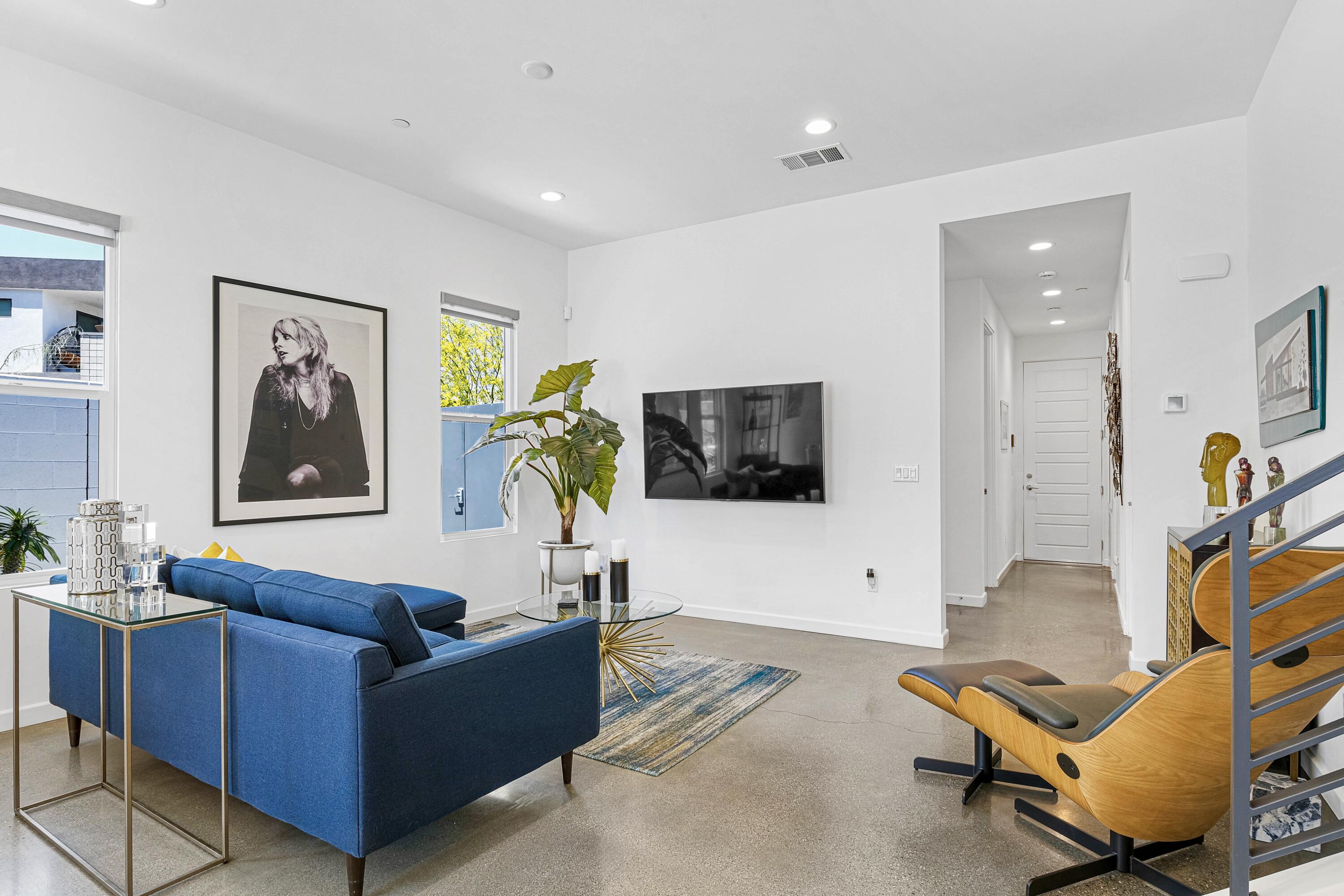 489 Beacon Way Palm Springs, CA 92262 - Photo 13 of 35 a living room with furniture and a flat screen tv