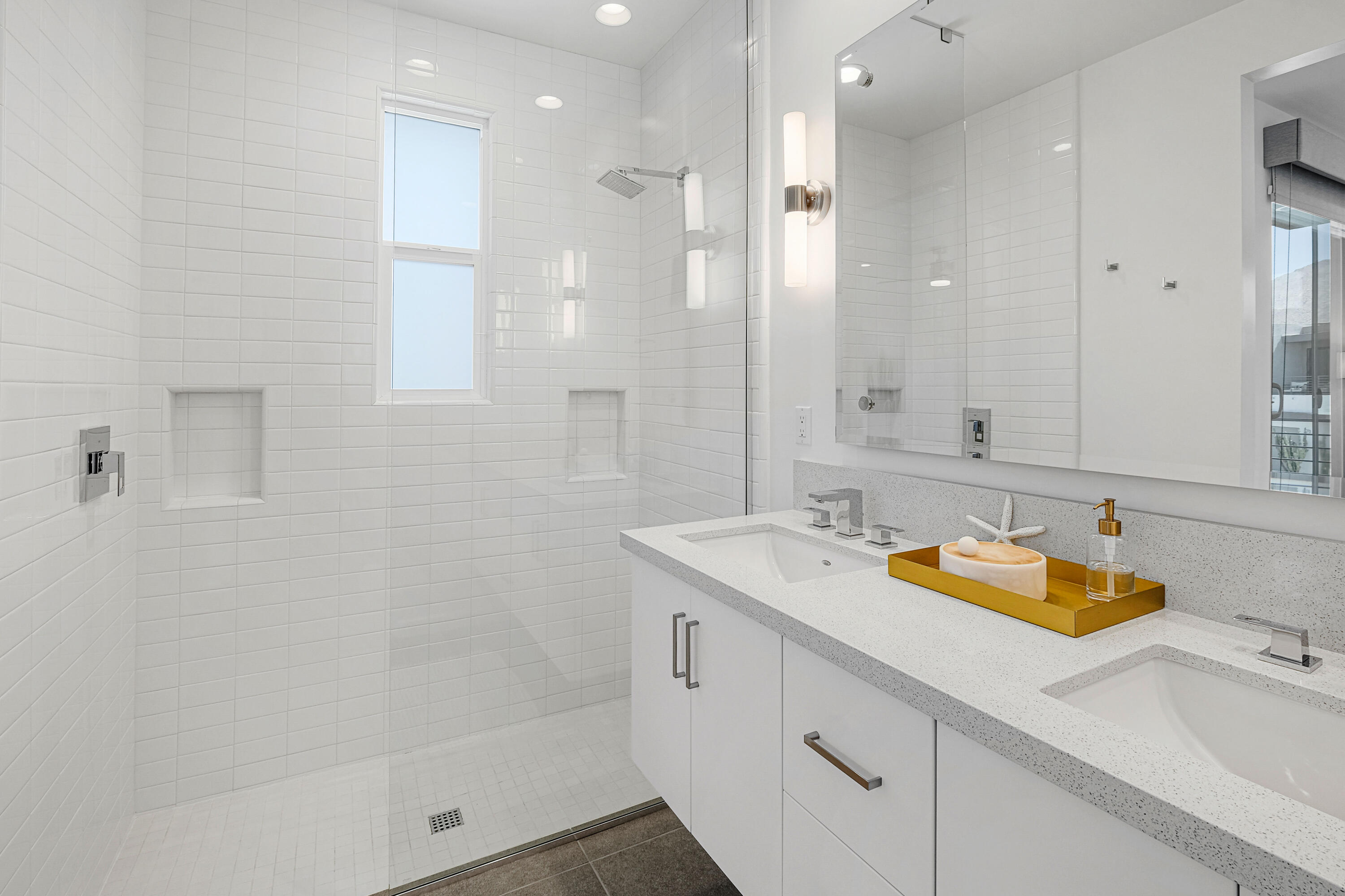 489 Beacon Way Palm Springs, CA 92262 - Photo 25 of 35 a bathroom with a sink and a mirror