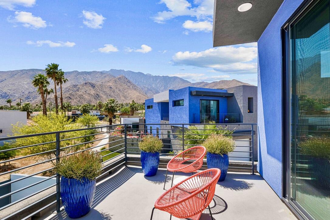 489 Beacon Way Palm Springs, CA 92262 - Photo 8 of 35 a view of a chairs and table in a patio