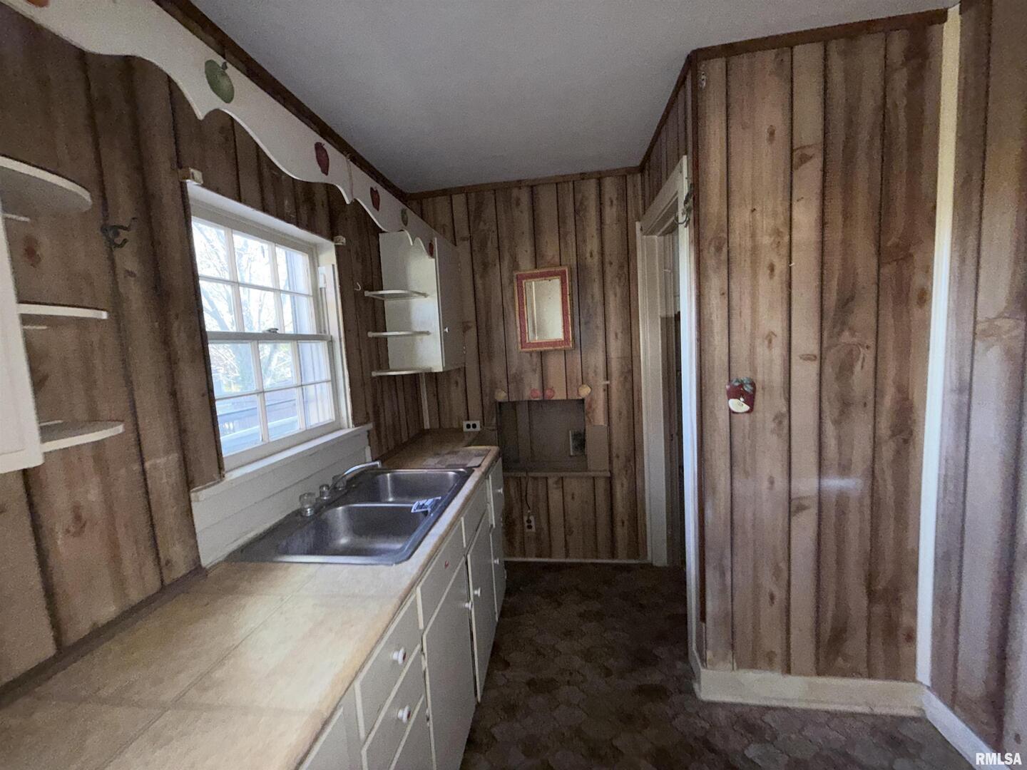 14322 North Memory Lane Mount Vernon, IL 62864 - Photo 14 of 19 a kitchen with a refrigerator and a sink