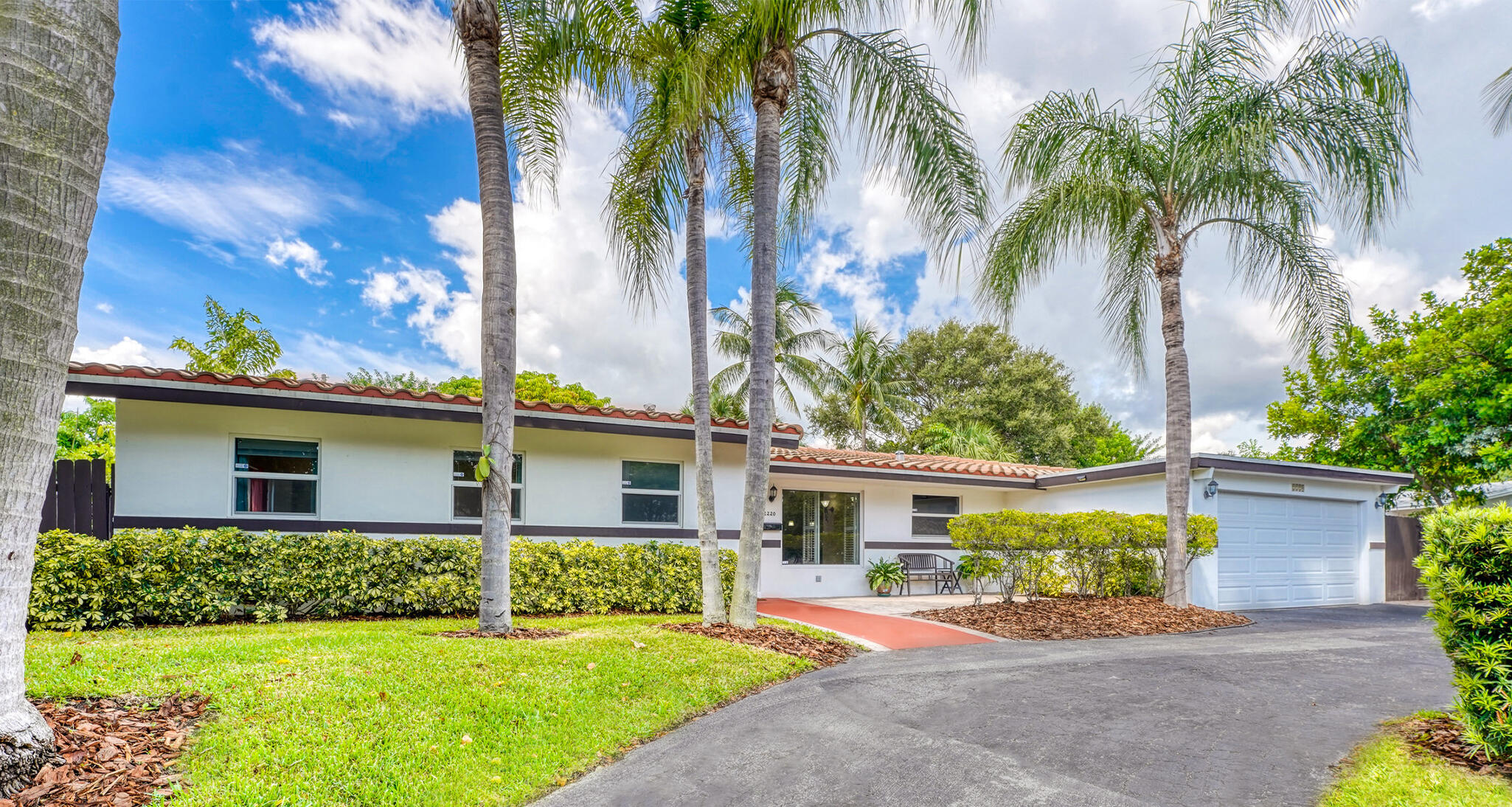 2220 Northeast 41st Street Lighthouse Point, FL 33064 - Photo 2 of 27 1 Front Southside