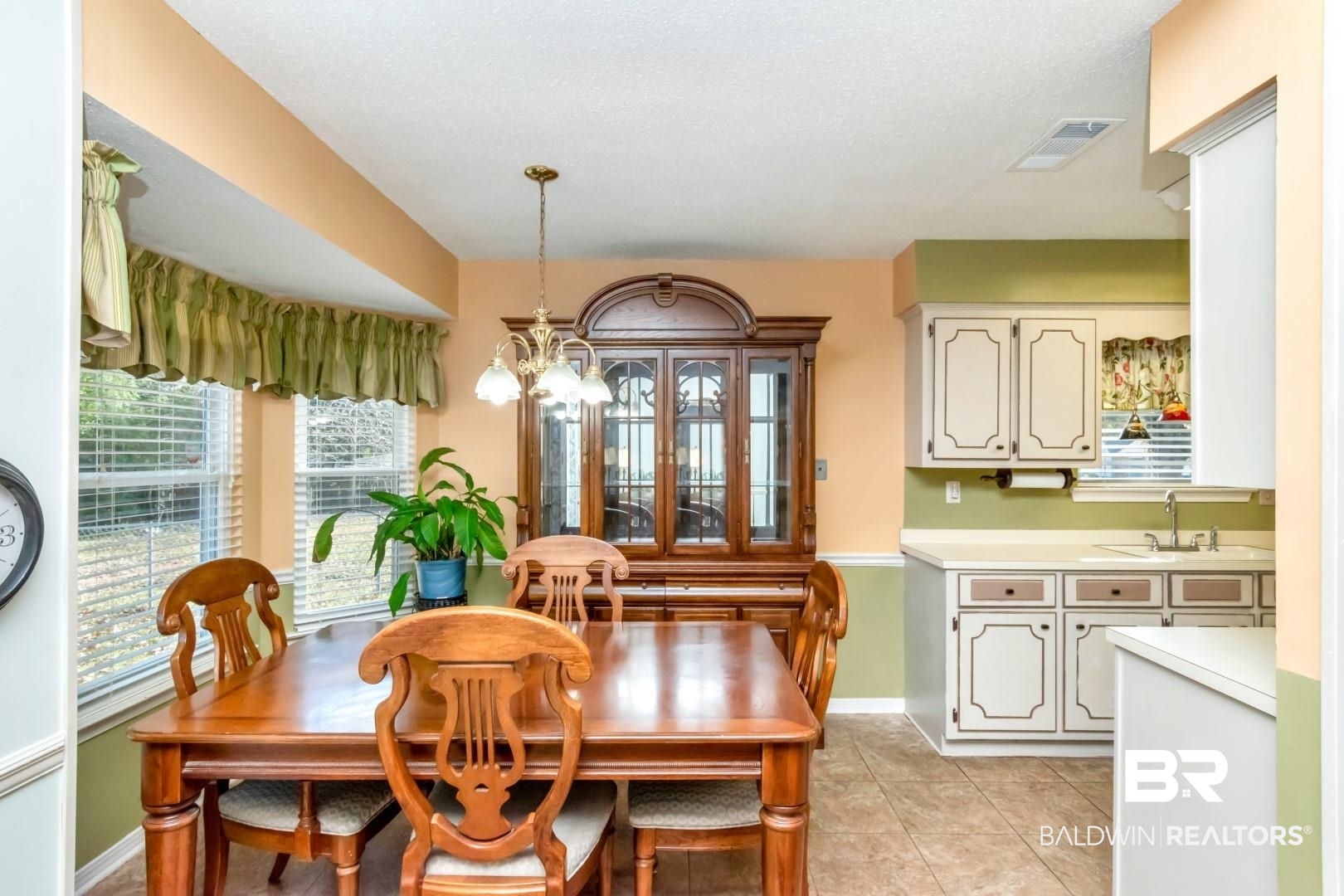 9360 Burnt Tree Drive Mobile, AL 36695 - Photo 7 of 28 Tiled dining area with sink