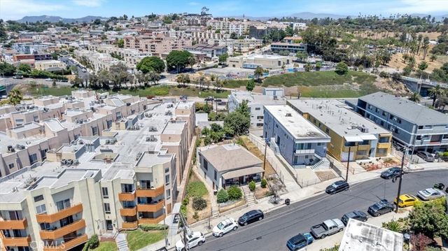 an aerial view of a city with lots of residential buildings