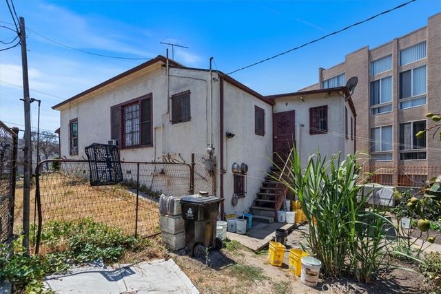 a front view of a house with patio