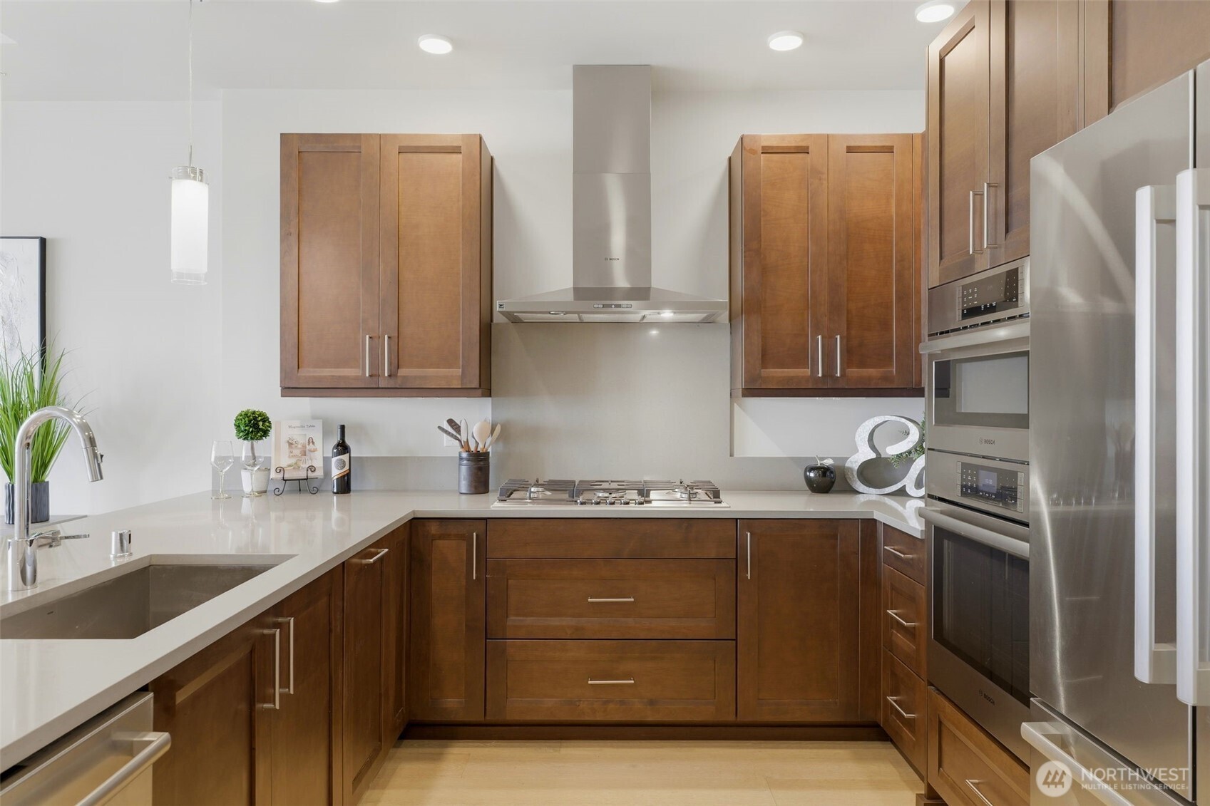 4907 Main Street, Unit 214 Tacoma, WA 98407 - Photo 7 of 34 a kitchen with a sink stove and refrigerator