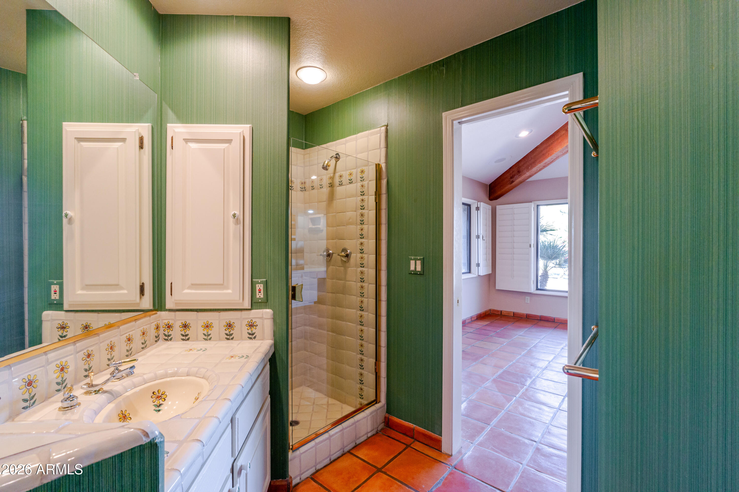 19125 East Vía Esquina Rio Verde, AZ 85263 - Photo 22 of 50 a bathroom with a sink and a mirror