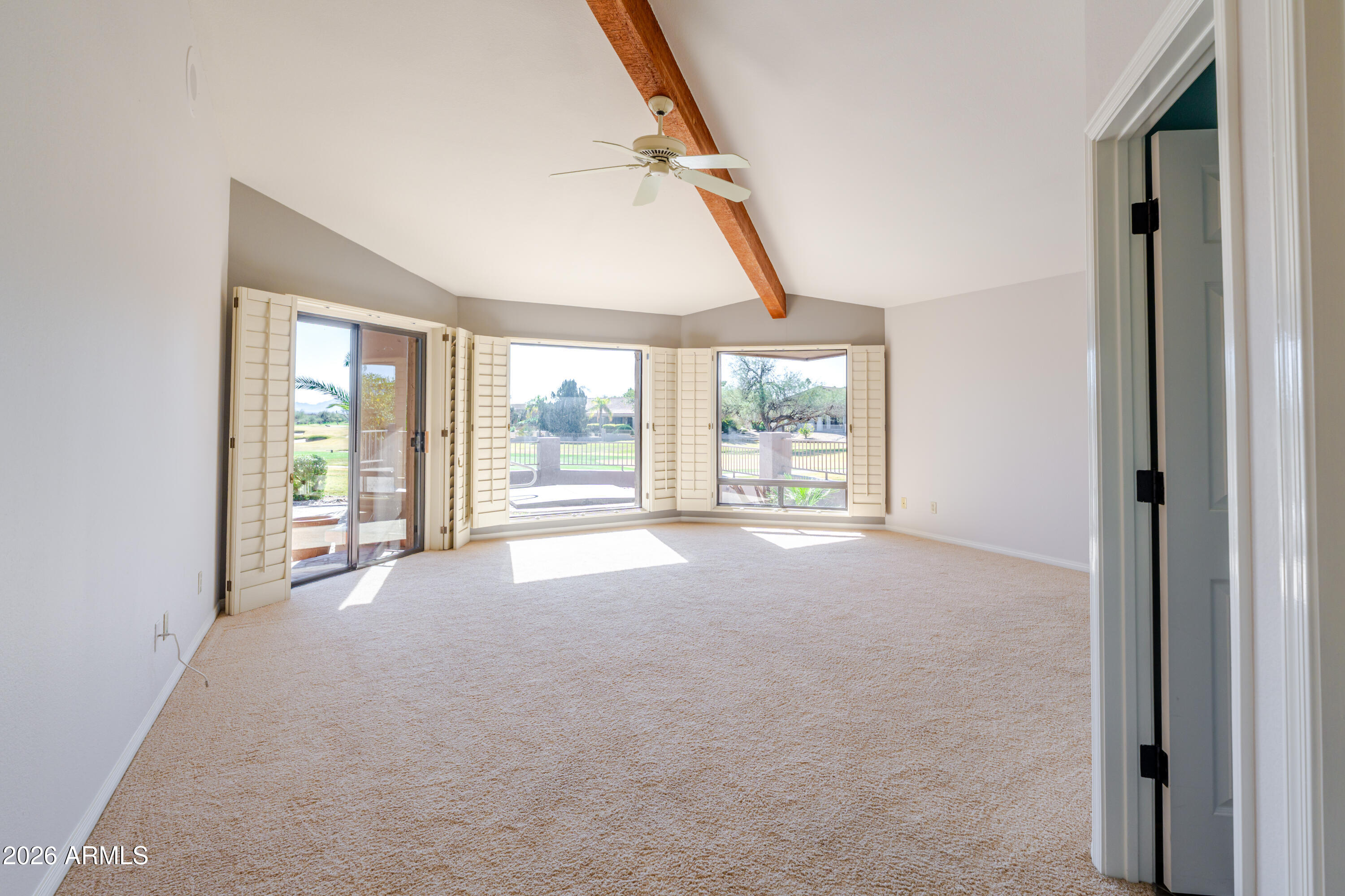 19125 East Vía Esquina Rio Verde, AZ 85263 - Photo 24 of 50 wooden floor and an empty room with large windows