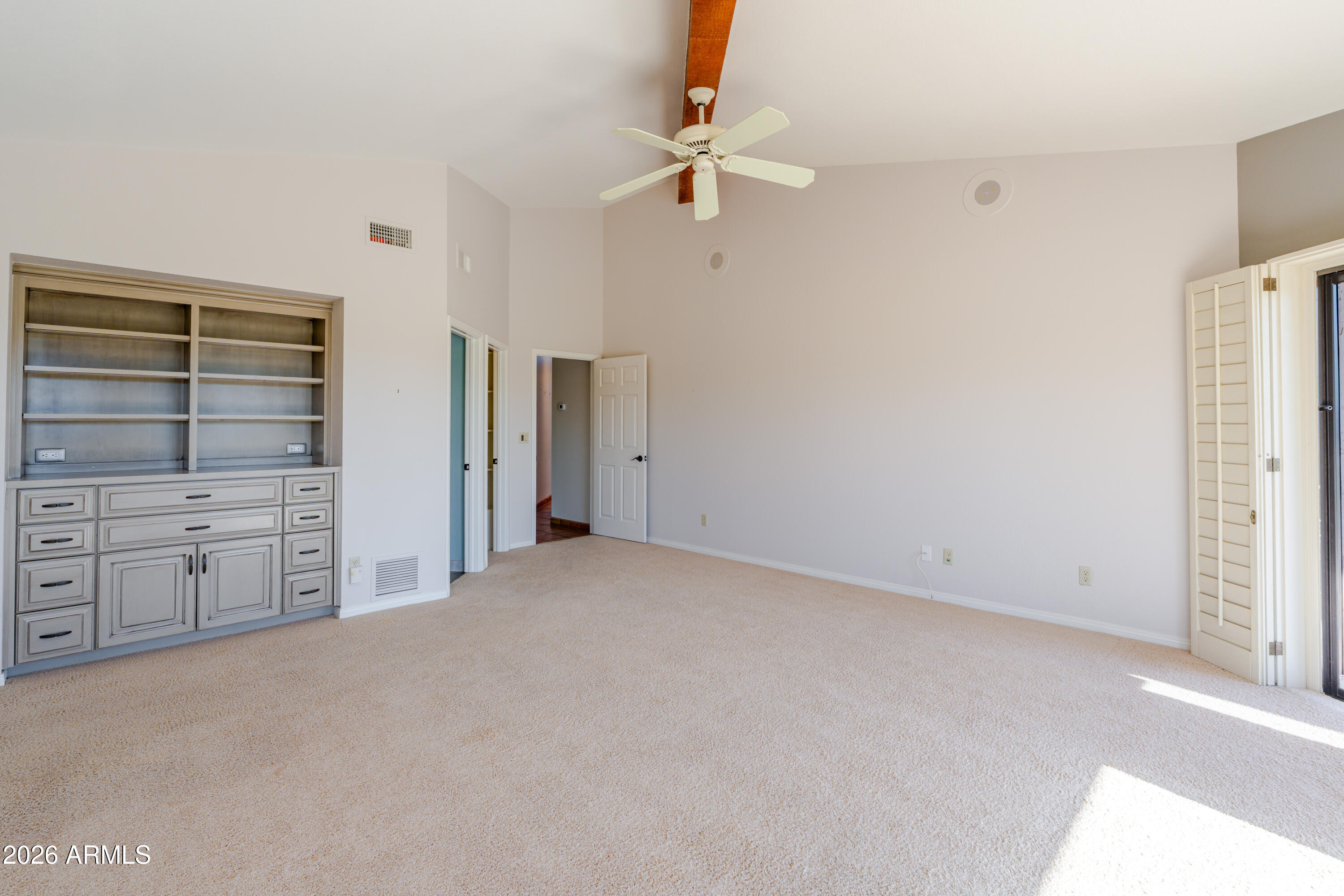 19125 East Vía Esquina Rio Verde, AZ 85263 - Photo 25 of 50 a view of an empty room with cabinet and a ceiling fan
