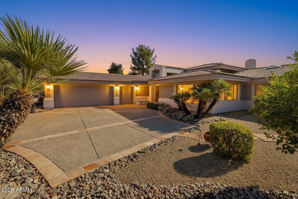 19125 East Vía Esquina Rio Verde, AZ 85263 - Photo 3 of 50 a front view of a house with garden