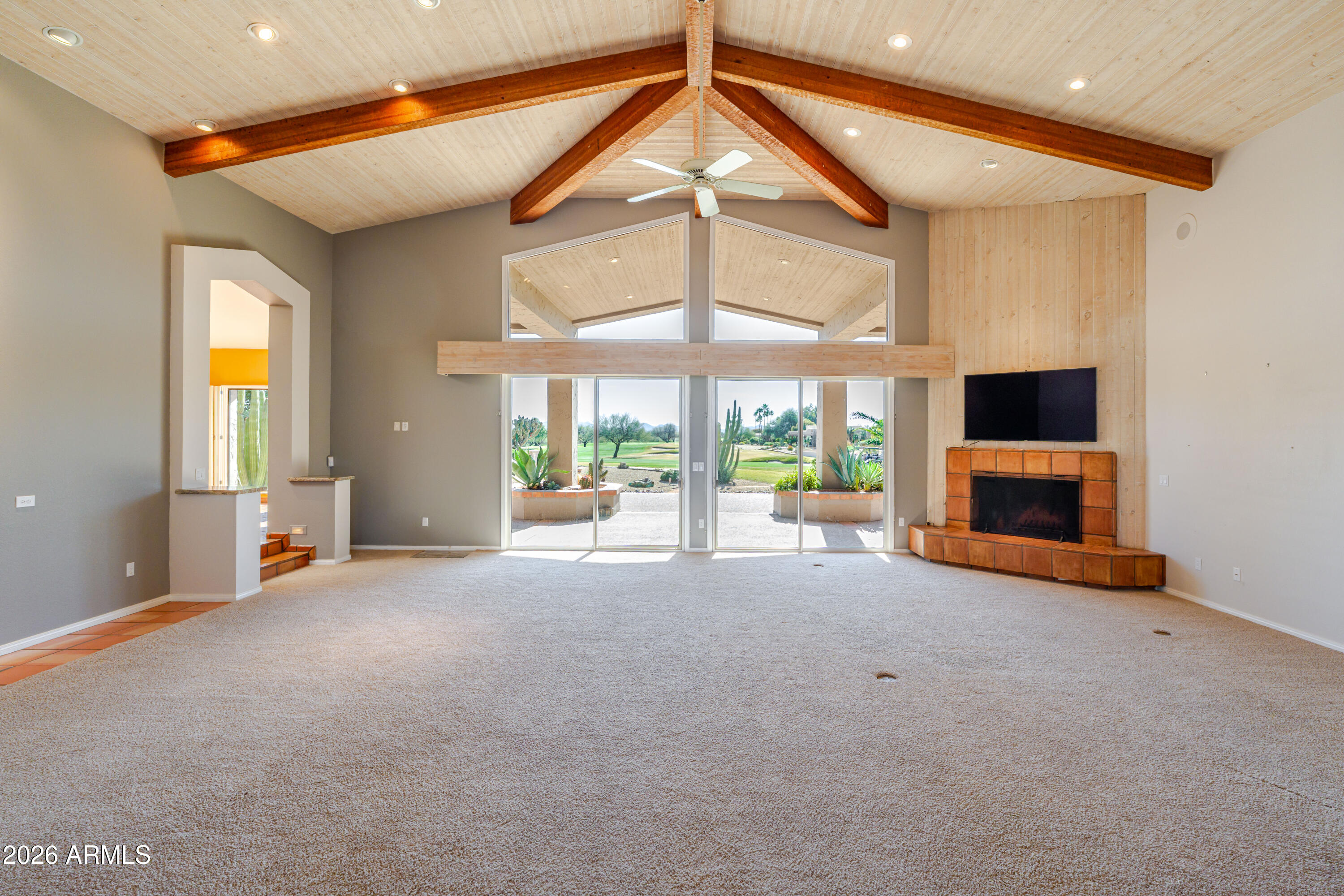 19125 East Vía Esquina Rio Verde, AZ 85263 - Photo 4 of 50 a view of a living room with a flat screen tv