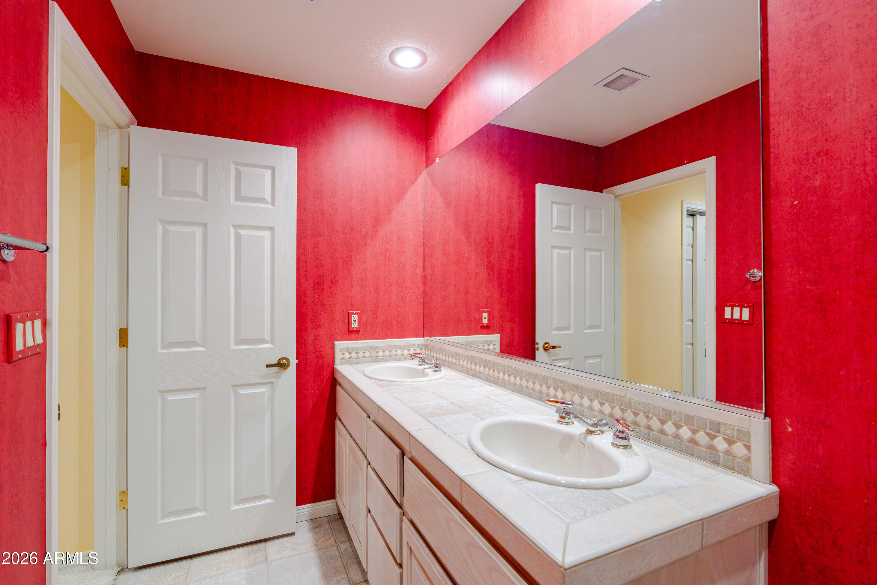 19125 East Vía Esquina Rio Verde, AZ 85263 - Photo 42 of 50 a bathroom with a sink vanity and a mirror