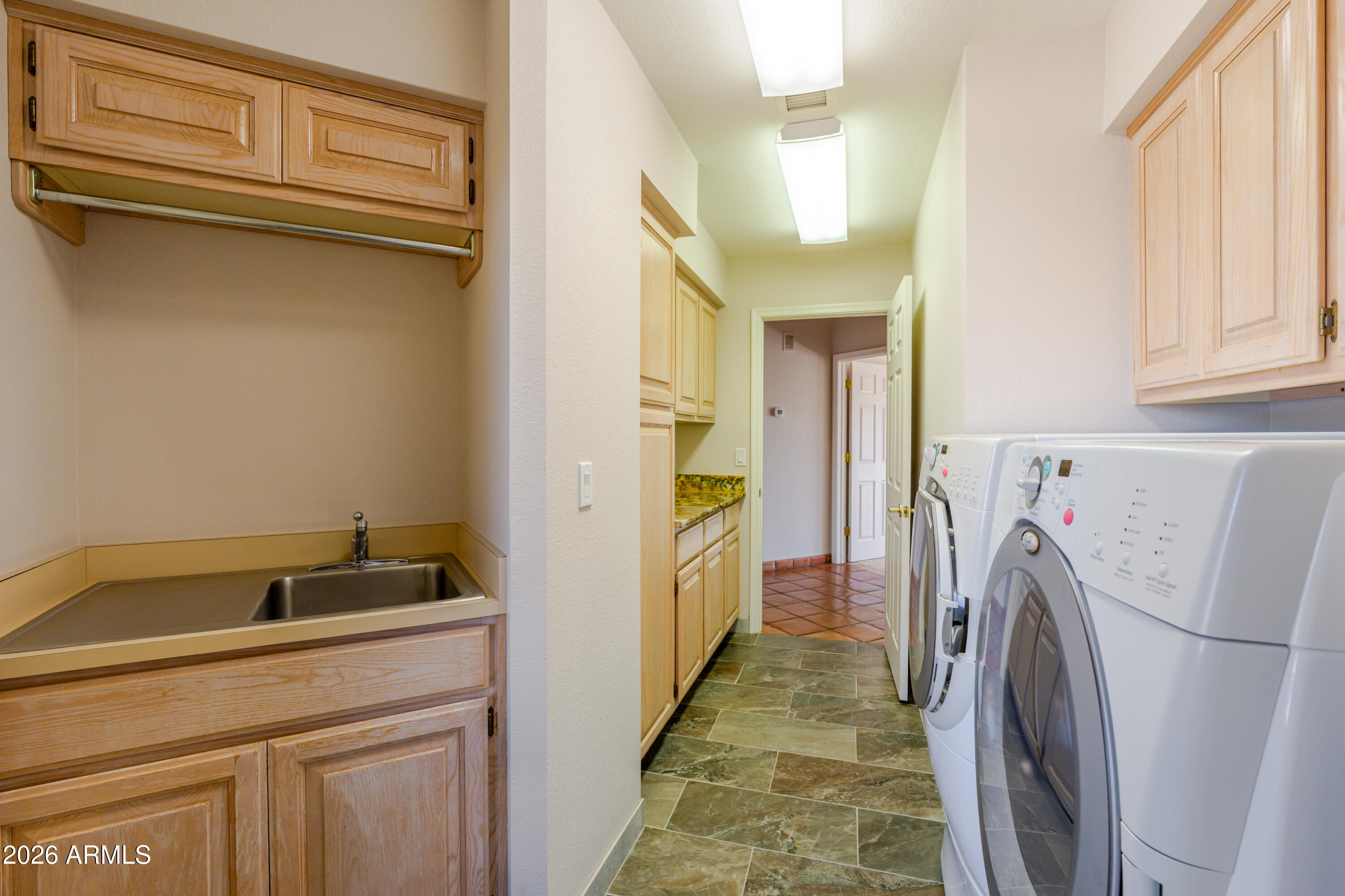19125 East Vía Esquina Rio Verde, AZ 85263 - Photo 44 of 50 a utility room with dryer and washer