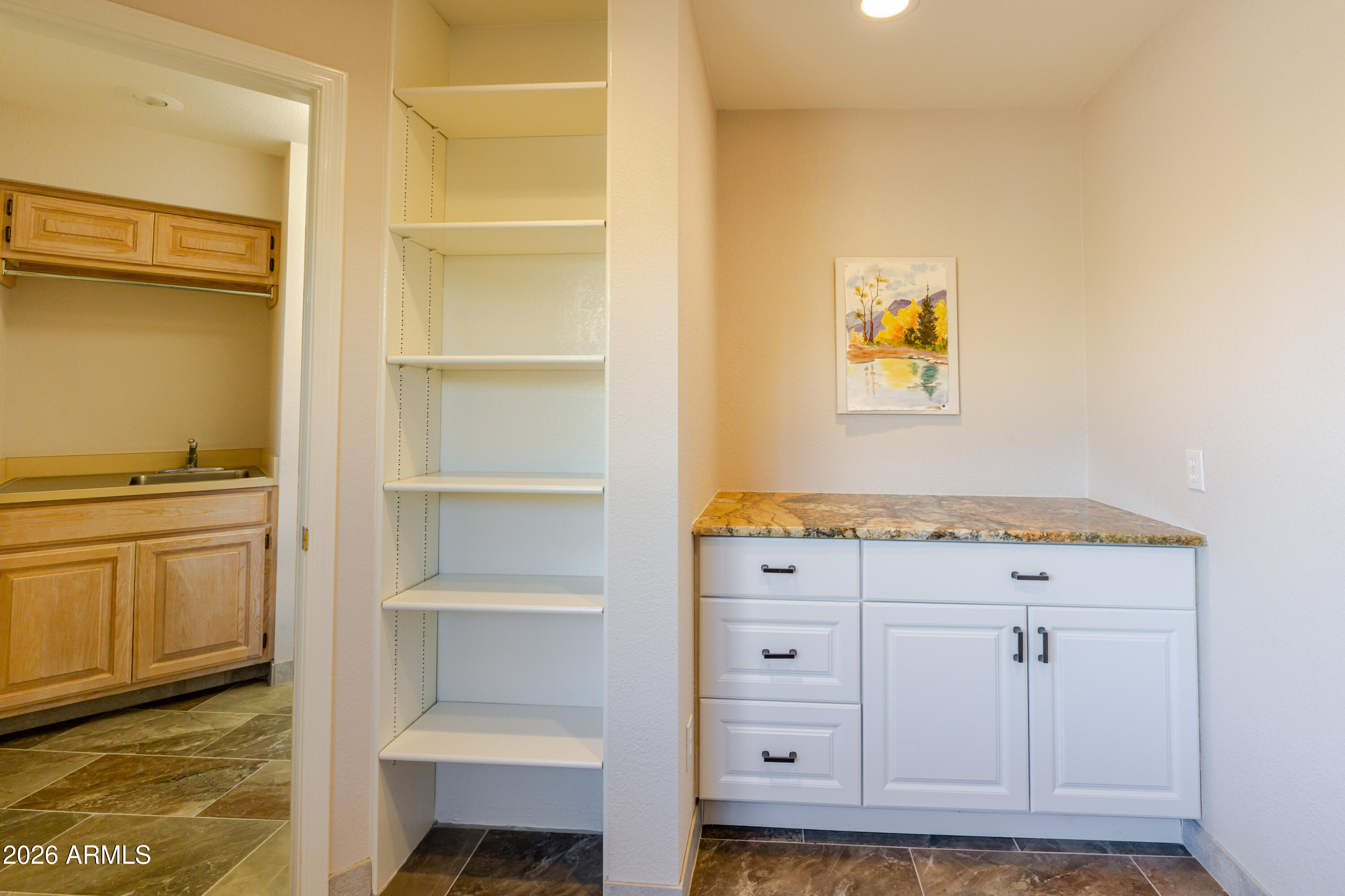 19125 East Vía Esquina Rio Verde, AZ 85263 - Photo 45 of 50 a view of cabinets and wooden floor