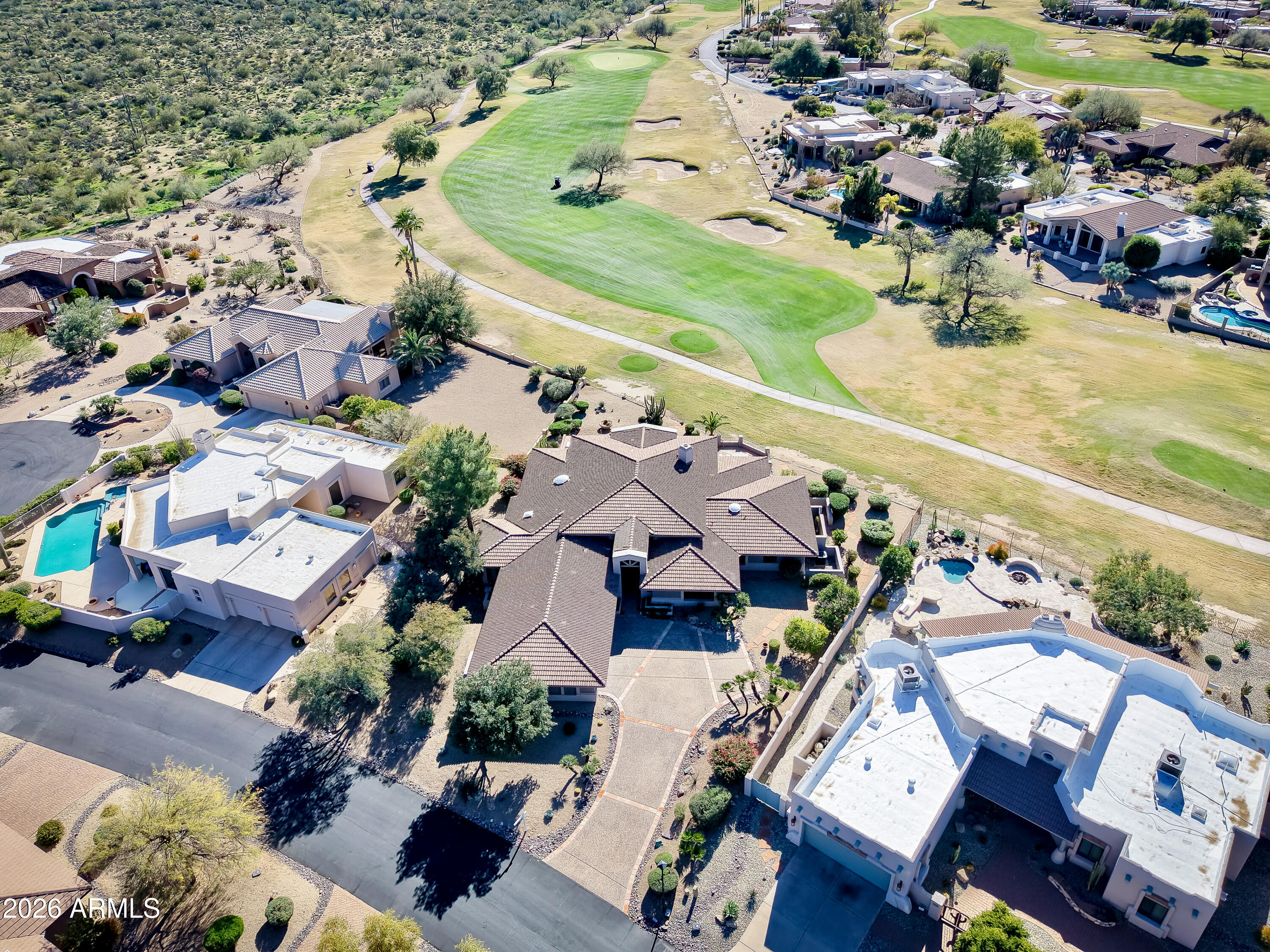 19125 East Vía Esquina Rio Verde, AZ 85263 - Photo 49 of 50 an aerial view of a house with a garden and lake view