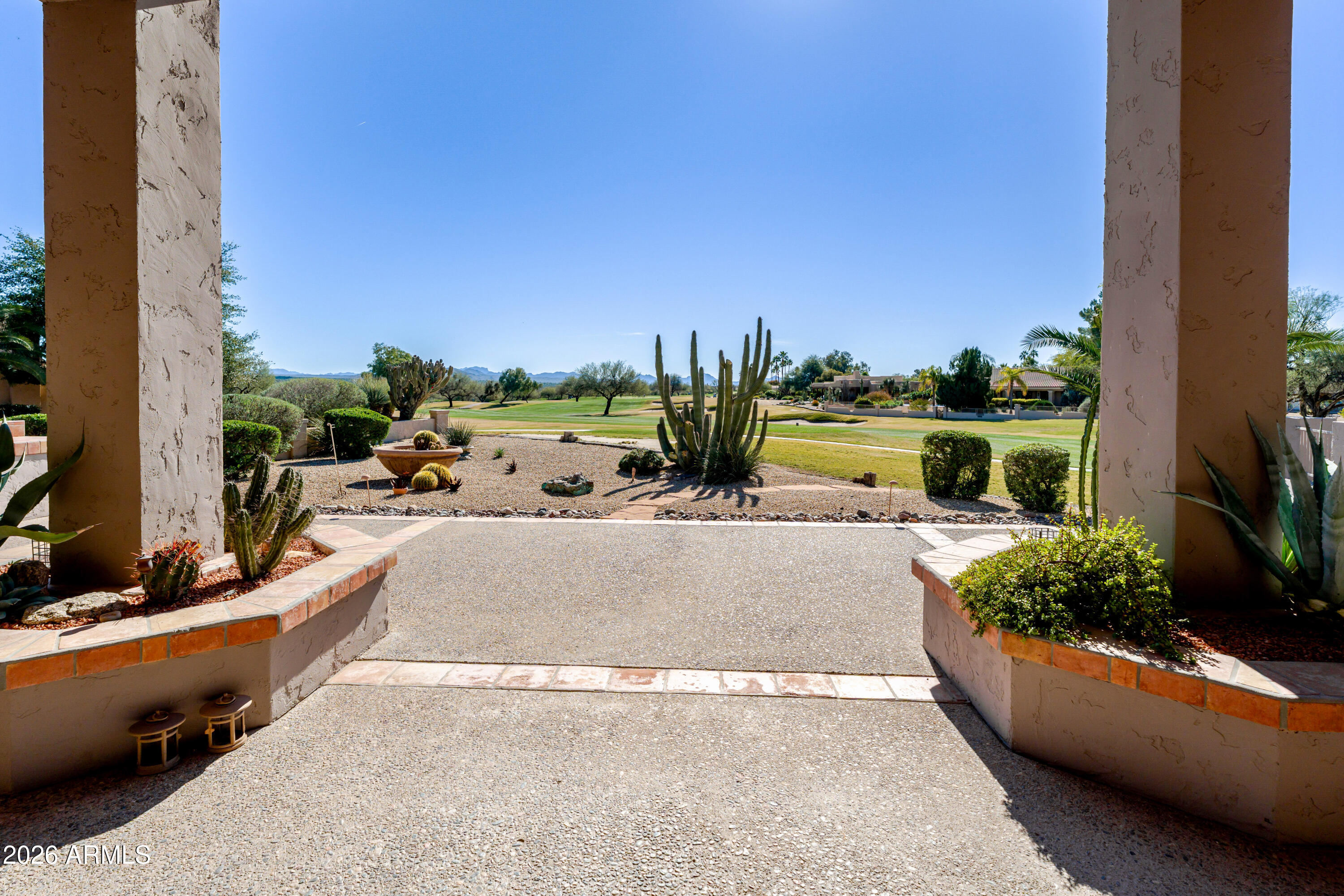 19125 East Vía Esquina Rio Verde, AZ 85263 - Photo 5 of 50 a view of a swimming pool next to a yard