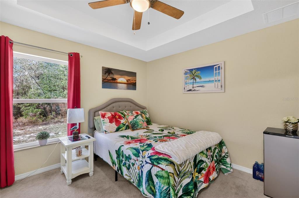 18168 Southwest 65th Loop Dunnellon, FL 34432 - Photo 18 of 26 a bedroom with bed and a window