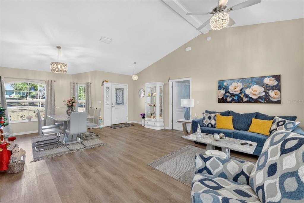 18168 Southwest 65th Loop Dunnellon, FL 34432 - Photo 7 of 26 a living room with furniture and wooden floor