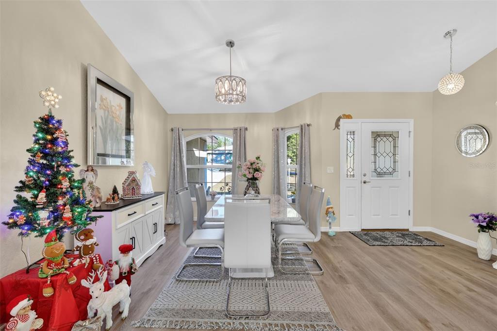 18168 Southwest 65th Loop Dunnellon, FL 34432 - Photo 9 of 26 a view of a dining room with furniture window and wooden floor