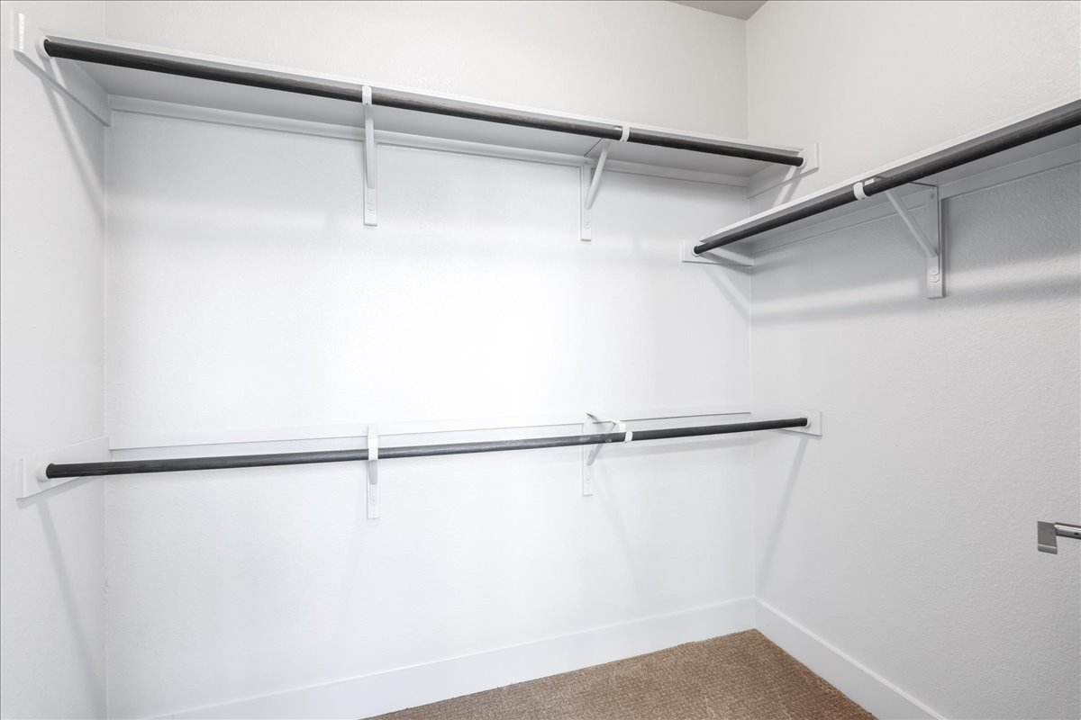 2021 Local Rebel Street, Unit 2021 Leander, TX 78641 - Photo 28 of 40 Spacious closet with carpet floors