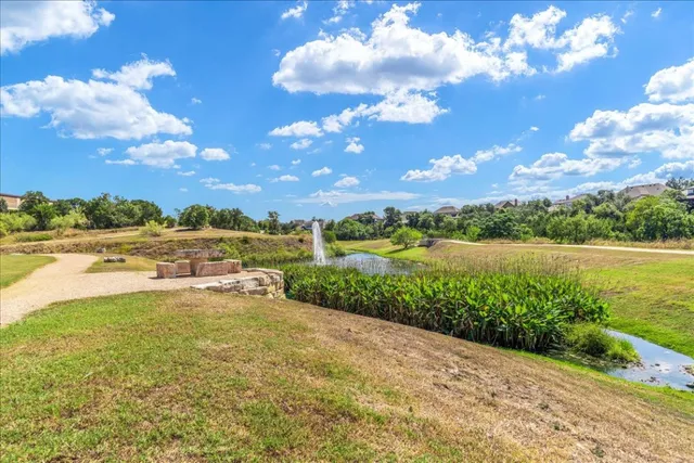 a view of a playground with basketball court