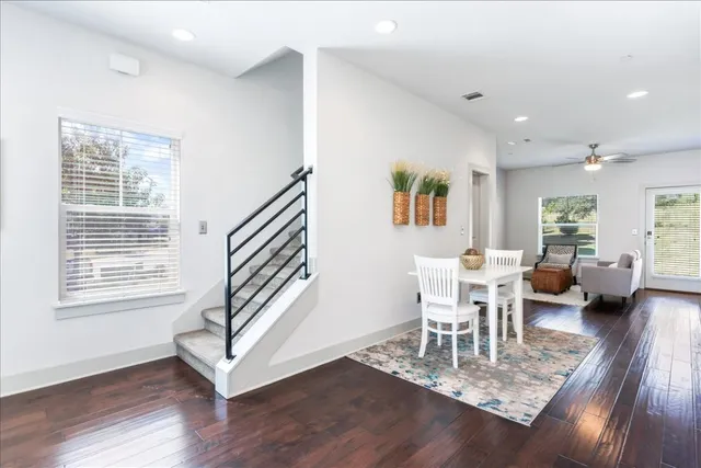a view of a livingroom with furniture and a table