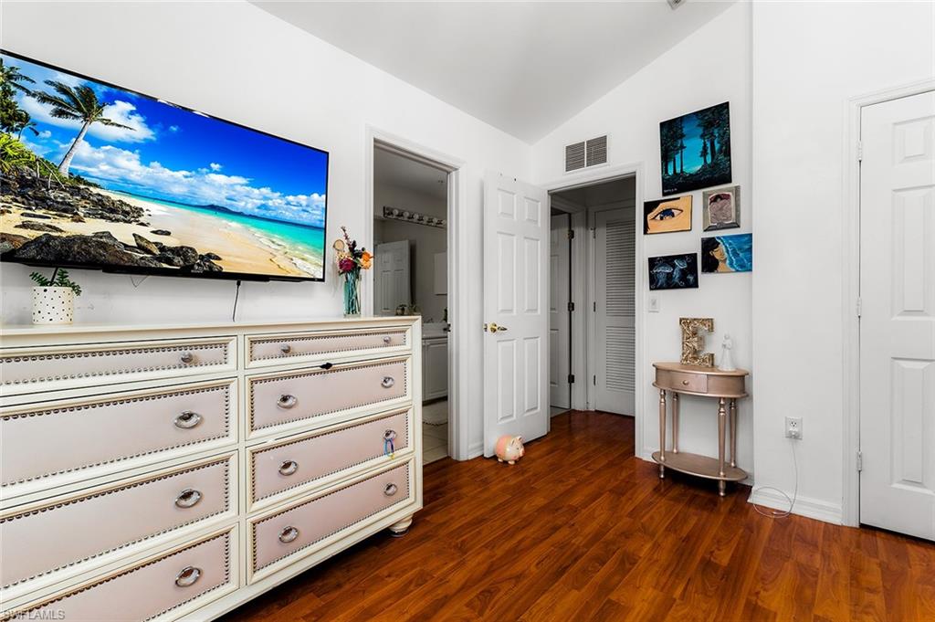1064 Hampton Circle Naples, FL 34105 - Photo 23 of 32 a view of a kitchen with wooden floor and cabinet