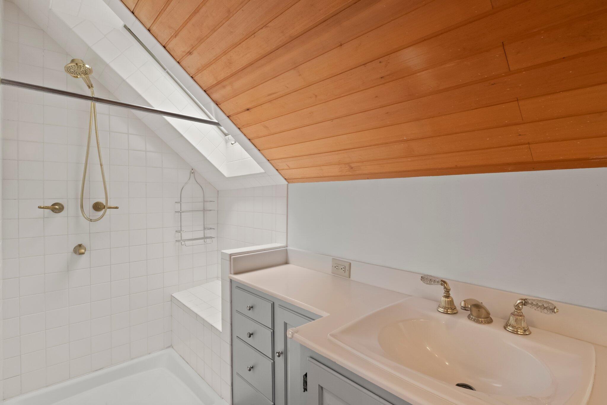 99 Main Street Sandwich, MA 02563 - Photo 23 of 43 a bathroom with a sink and vanity