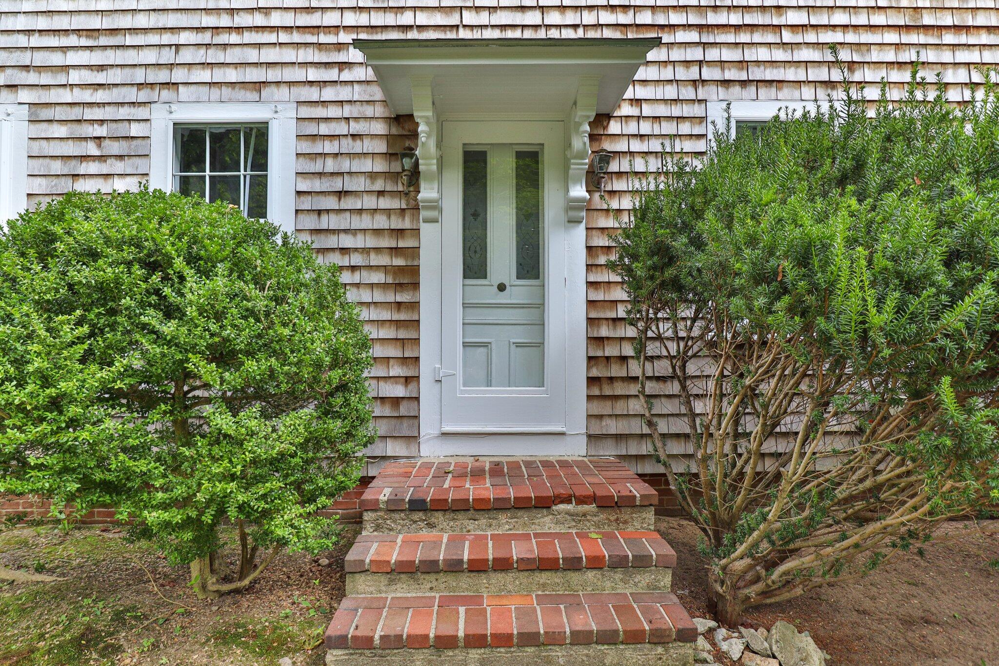 99 Main Street Sandwich, MA 02563 - Photo 6 of 43 a view of entryway with a yard