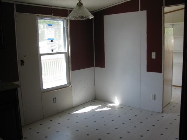 812 Hale Road Northeast Pilot, VA 24138 - Photo 16 of 16 a view of an empty room with window and wooden floor